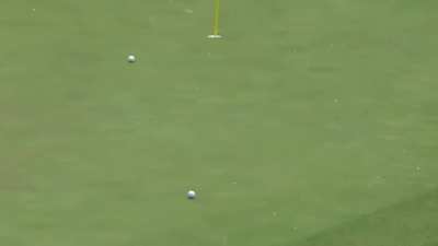 Guy shoots the impossible hole-in-one by using the golf ball as a skipping stone