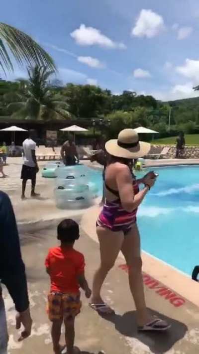 Man slides from a water slide