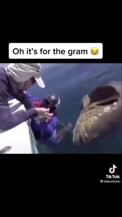 Hold The FISH HE FLOATS