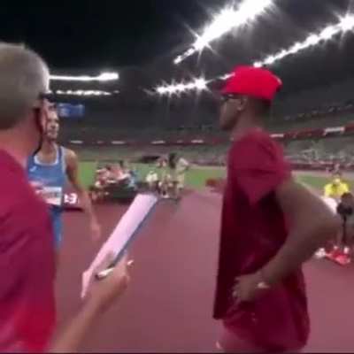 Qatari ?? and Italian ?? high jumpers Mutaz Barsham and Gianmarco Tamberi are approached about a high-jump tiebreaker jump-off… but agree to share Olympic gold. The true essence of sportsmanship