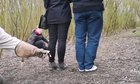 ? Great Horned Owl swooping in tiny gap between two people ?