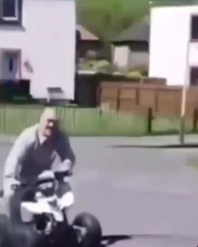 An Elderly Performing A Magic Trick On A 4 Wheeler.