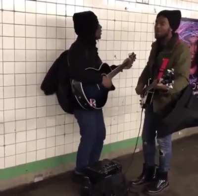 Street performers covering "the beetles" songs. ( Better with sound on )