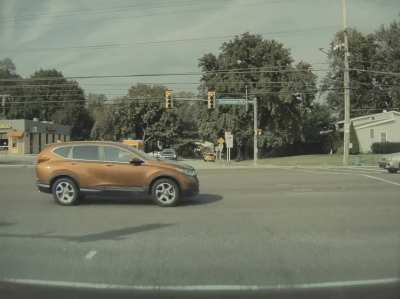 Happened this morning on my way to work. Orange van inched forward which cued the Subaru to go. Her light was red.