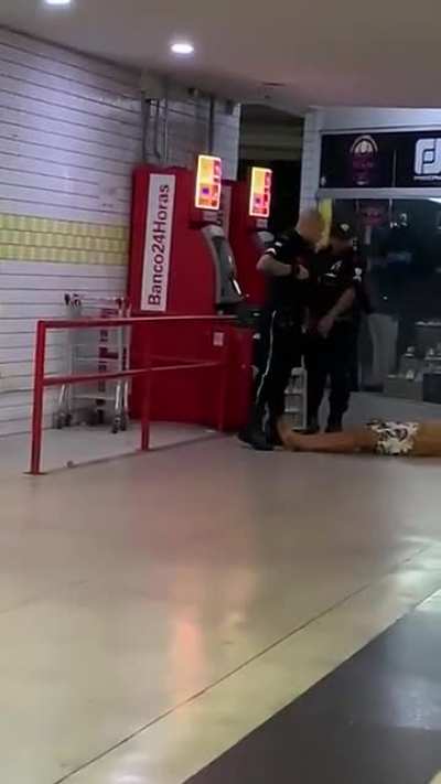 Some dude trying to argue with a private security in Brazil