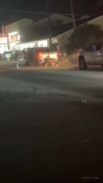 Man Gets Slammed and Stuck on Pickup Truck Hitch During Fight, Truck Takes Off