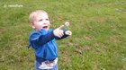 Adorable kid eats dandelion after blowing it fails