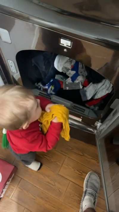 Helping with the laundry