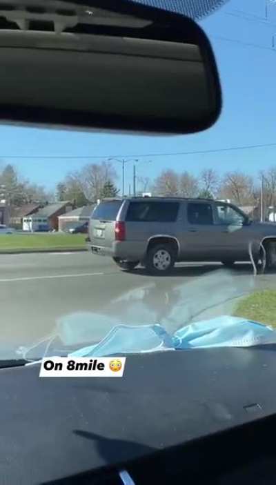 WCGW putting a car in reverse, getting out, and locking the doors. (8 Mile in Detroit, MI, USA)