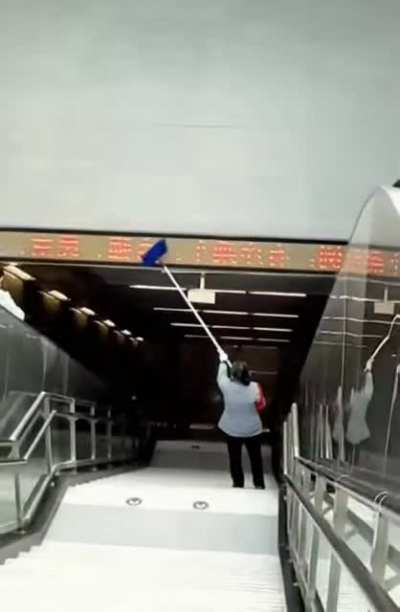 Cleaning this "moving" advertising panel
