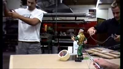 The special effects crew from Stan Winston Studio testing the puppets used in "Small Soldiers" (1998)