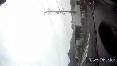 Idiot not paying attention to car stopping for pedestrian