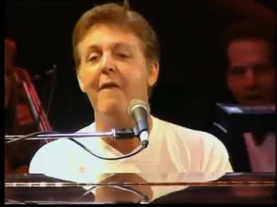 Paul McCartney, Elton John, Sting, Eric Clapton, Mark Knopfler and Phil Collins performing "Hey Jude" in 1997