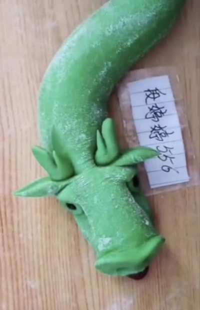 Chef makes a dragon out of Mochi (Japanese rice cake)