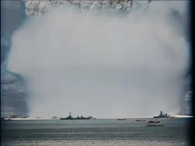 Atomic Bomb Test: Operation Crossroads, conducted by the US at Bikini Atoll, 1946. The purpose of the two-part tests was to investigate the effect of nuclear weapons on warships. The footage shown is from the second test 'Baker', detonated at 90 feet (27