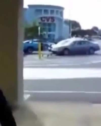 Guy does a skateboard trick
