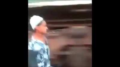 Standing extremely close to a train