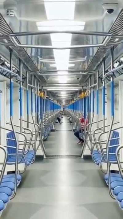 Looking down at moving subway