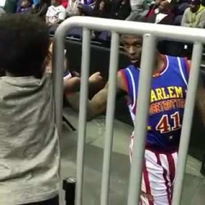 Taking the extra time to make this fan's "high five" a memorable one