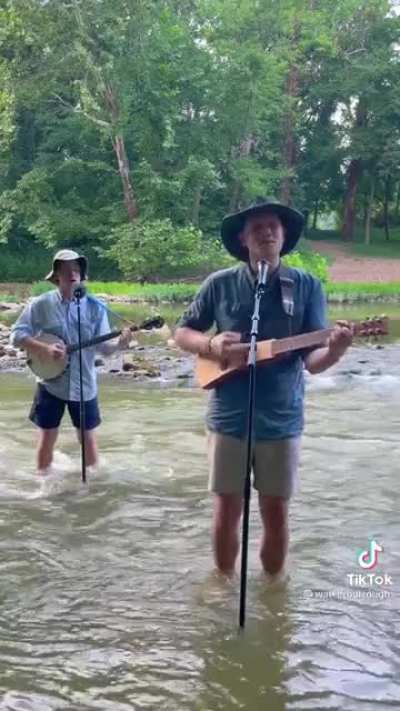 Cry Me A River in a river.