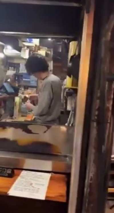 Omoide Yokocho is a narrow street in Tokyo with over 70 tiny bars and barbecue stands. It looks like it's straight out of "Blade Runner."