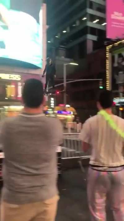 This guy flying thru Times square last night.