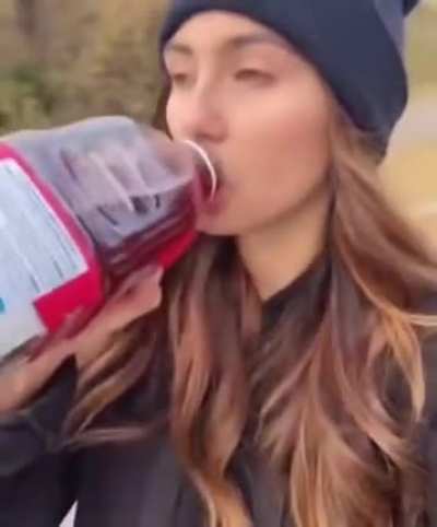 Recording and drinking juice instead of paying attention while skate boarding