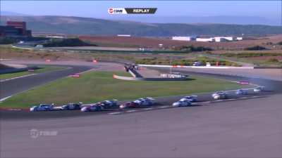 2 cars end up stacking on top of each other during a race