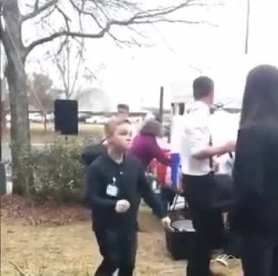 Girl tries her best to tolerate another desperate mating display as a poor kid dances his heart out.