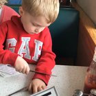 My little brother at a restaurant...