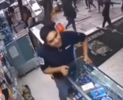 Employee accidentally knocks over counter in a haste
