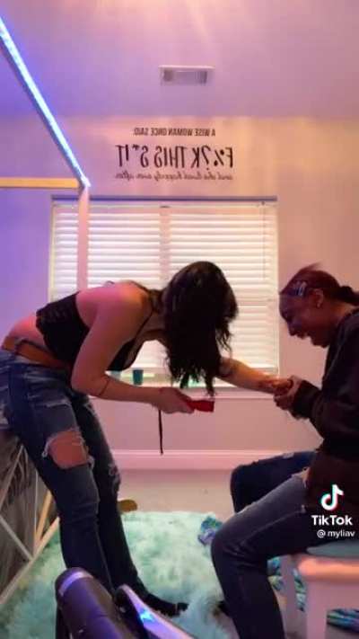 Woman on the right wanted to know if a taser is "different for black people and immediately chickens out