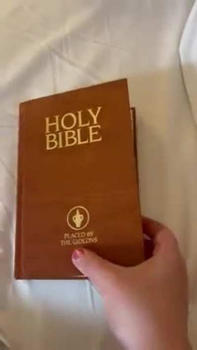 This hotel room bible has an extra chapter.
