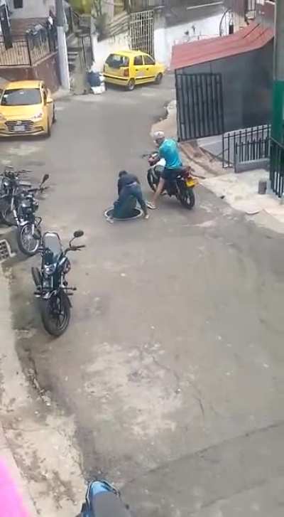 Trying to steal a manhole cover