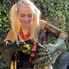 Real life Disney princess, visited by a baby hummingbird