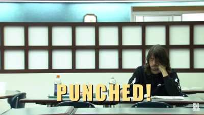 Andy Samberg punches Taylor Hawkins and Dave Grohl. RIP Taylor Hawkins