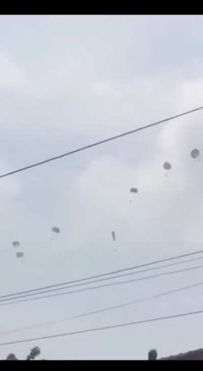 This is the moment an Indonesian paratrooper plunged 1,600ft when his parachute got tangled during a training exercise - but miraculously survived