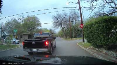 Someone playing on their phone at the stop sign next to my house...