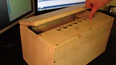 This was made using an old inkjet printer, 8 standard switches, an RC-servo, an ATmega8, a L293D and a L7805. I wish I had the same reaction speed as this machine
