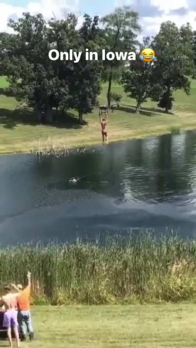 Iowa man hangs onto drone,flies