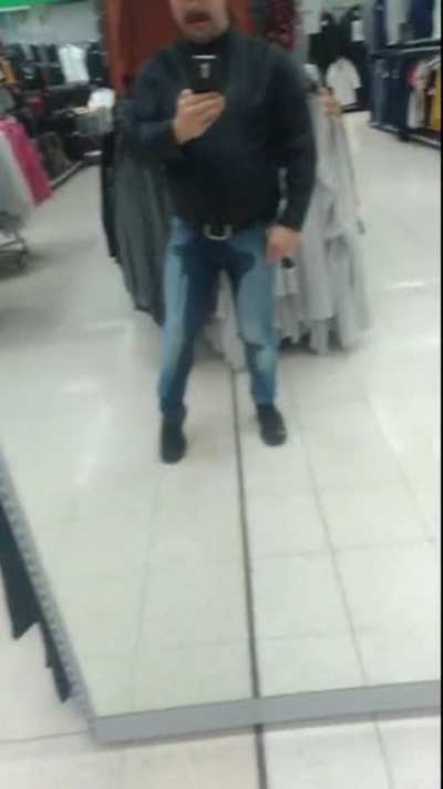 Dude pees himself in a store