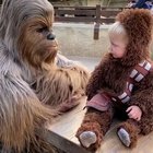 A baby meeting Chewbacca
