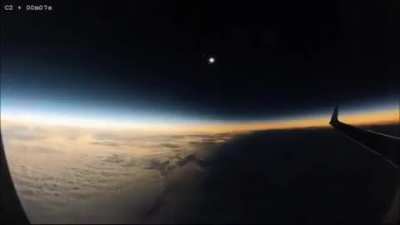 ? The view of a solar eclipse from an aircraft in flight