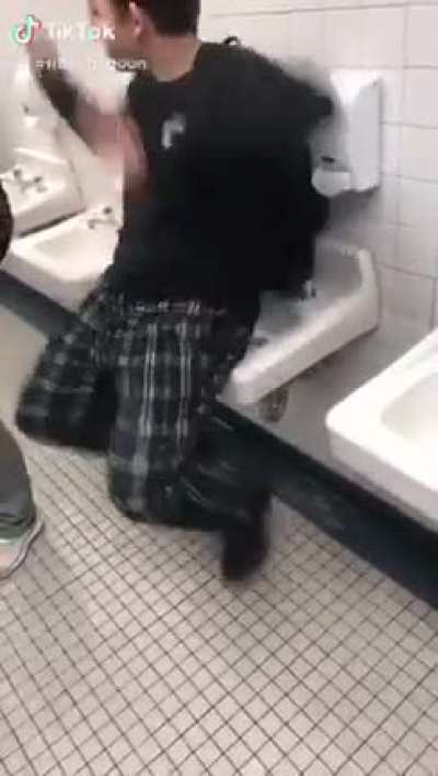Sitting on a sink and dancing