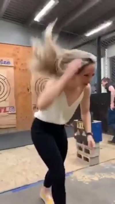 Just a girl throwing an axe
