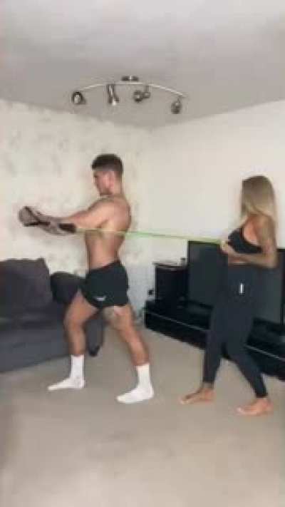 Simply holding a rubber band and pulling it, WCGW?