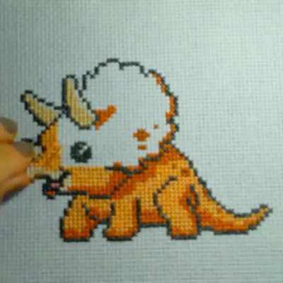 x400 speed timelapse cross stitching. This one is called "Small Dinosaur"