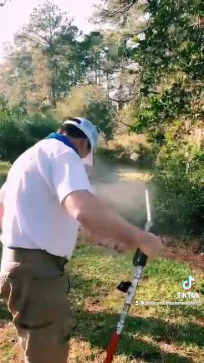 Demonstrating pressure washer with interchangeable tips