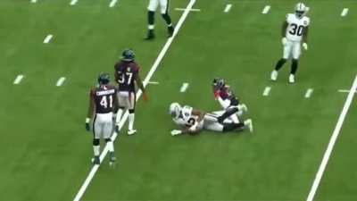 Zay Jones standing up after being tackled
