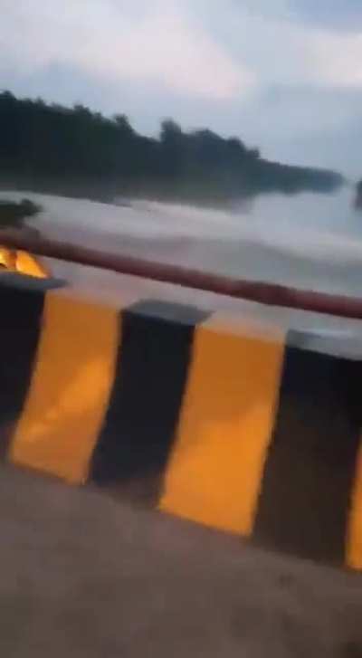 Backhoe loader plunged into river while attempting to demolish century old bridge 2022.